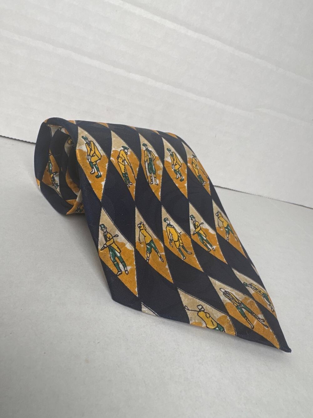 Ambassador hand made neck tie golf player dark blue and yellow